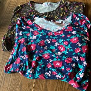 Two size 3X Lulalemon T-shirts/tops. Short sleeved round neck longer the back.